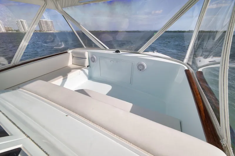 Slide: The Image of Interior view of 1997 Garlington 61 yacht with ocean backdrop and city skyline. - 22