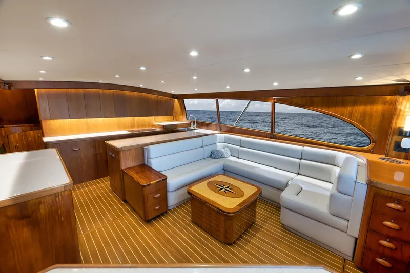 Slide: The Image of Luxurious 1997 Garlington 61 yacht interior with elegant wood finishes and spacious seating. - 40