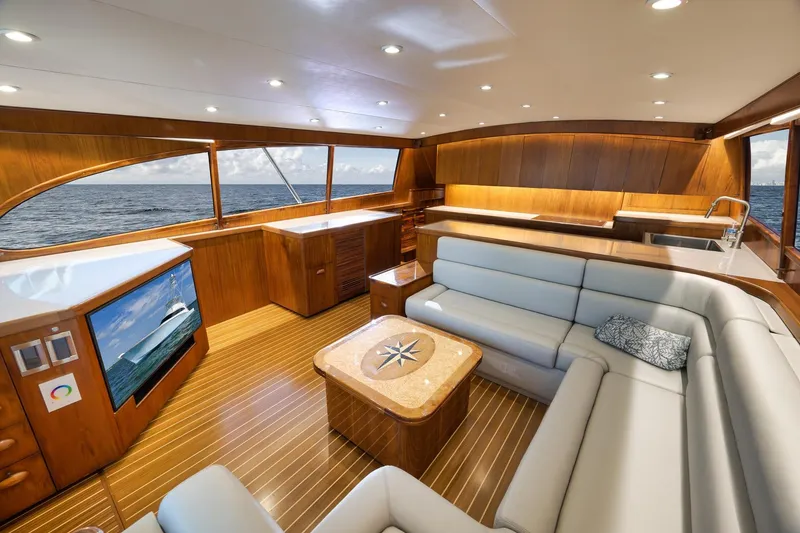 Slide: The Image of Luxurious 1997 Garlington 61 yacht interior with elegant wood finish and ocean view. - 44