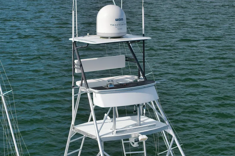 Slide: The Image of Garlington 61 boat tower with radar, 1997 model, on calm water. - 7