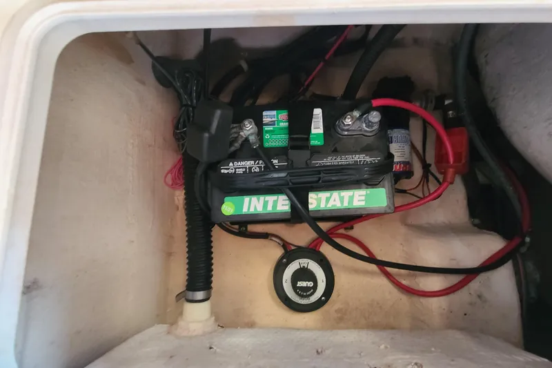 Slide: The Image of Battery compartment of a 2002 Pro-Line 22 Sport boat with Interstate battery. - 20