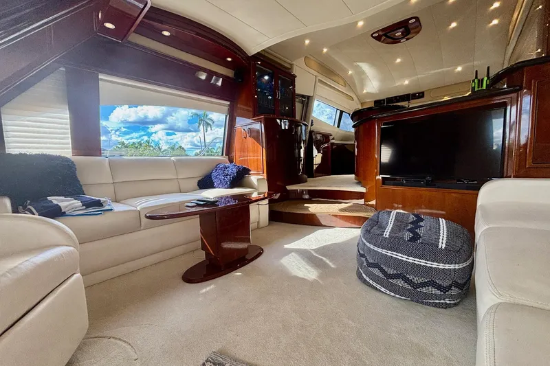 Slide: The Image of Luxurious interior of a 2004 Marquis 59 yacht with plush seating and modern amenities. - 20