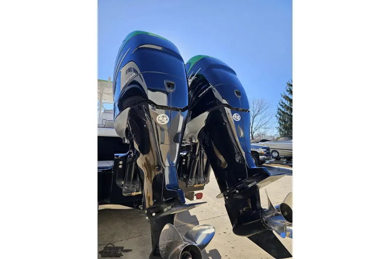 Slide: The Image of 2014 Concept 36' CC boat with dual outboard engines, parked outdoors. - 40