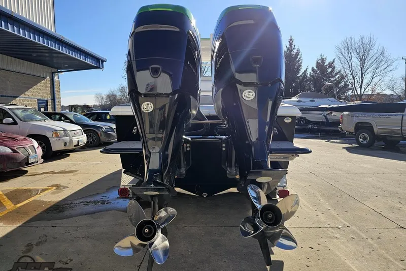 Slide: The Image of 2014 Concept 36' CC boat with dual outboard motors in a parking lot. - 41