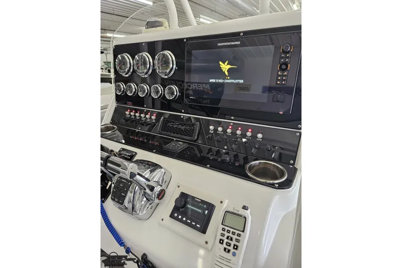 Slide: The Image of Control panel of 2014 Concept 36' CC boat with gauges and chartplotter. - 61