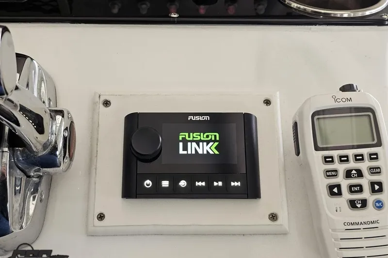 Slide: The Image of Control panel of a 2014 Concept 36' CC boat with Fusion Link and Icom devices. - 65