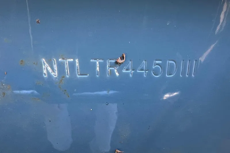 Slide: The Image of Hull identification number on blue Grady-White Freedom 307, 2011 model. - 12