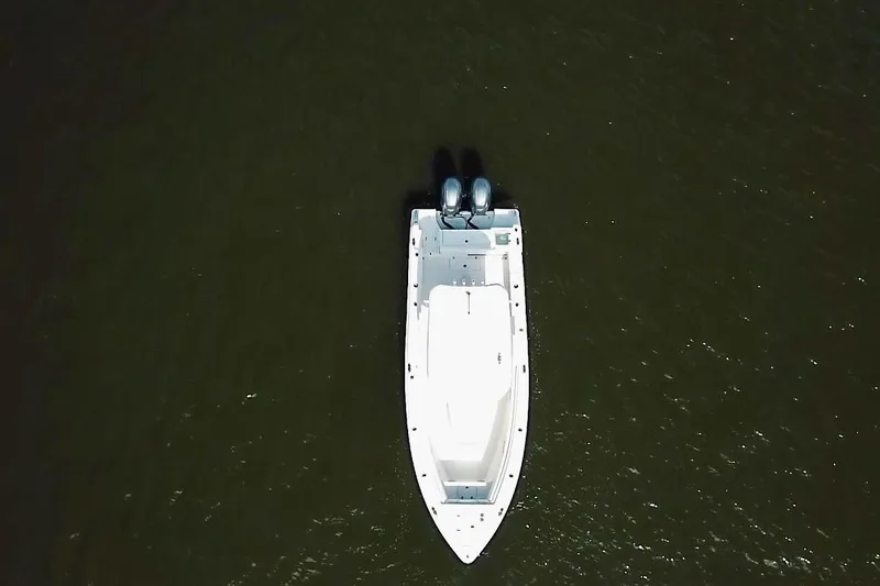 Slide: The Image of Aerial view of 2018 Sea Hunt Gamefish 27 Coffin Box boat on water. - 6