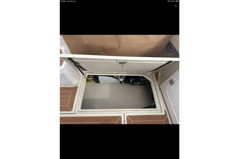 Slide: The Image of Interior of 2021 Ranger Tugs R-29 S boat with kitchen and city view. - 17