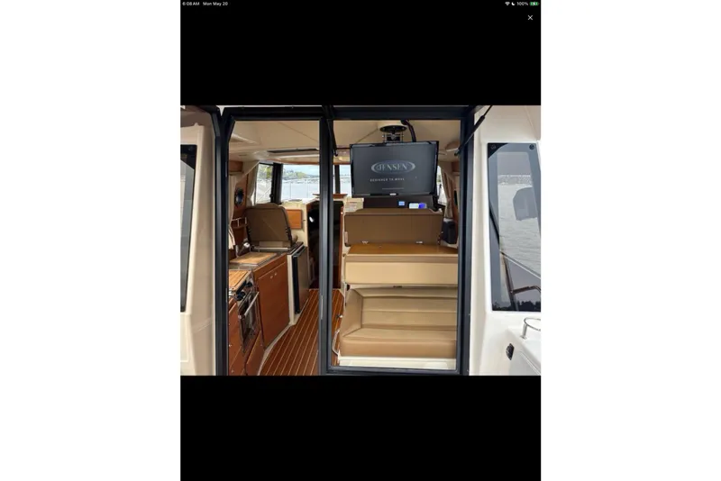 Slide: The Image of 2021 Ranger Tugs R-29 S interior heater controls and power outlet. - 20