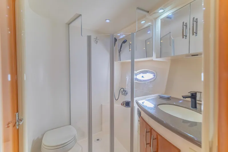 Slide: The Image of Luxurious bathroom in 2006 Carver 36 Mariner yacht with modern fixtures and shower. - 10