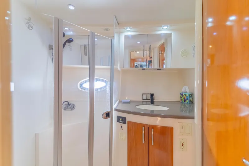 Slide: The Image of Luxurious bathroom interior of 2006 Carver 36 Mariner yacht with modern fixtures. - 11
