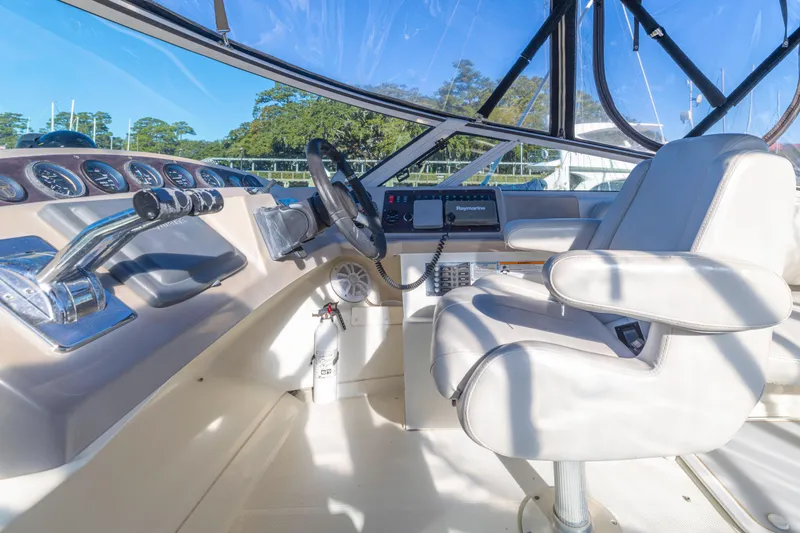 Slide: The Image of Interior helm of 2006 Carver 36 Mariner yacht with steering wheel and controls. - 19