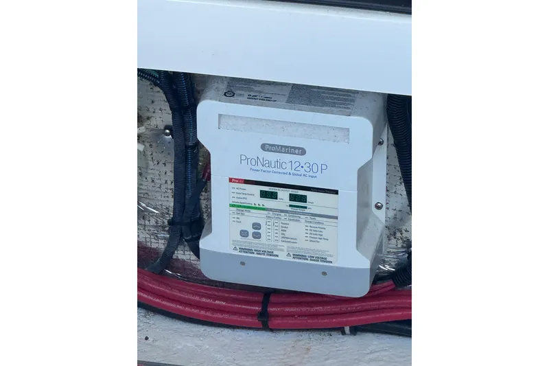 Slide: The Image of ProNautic 12-30P charger in 2014 Regal 3200 Bowrider boat. - 22