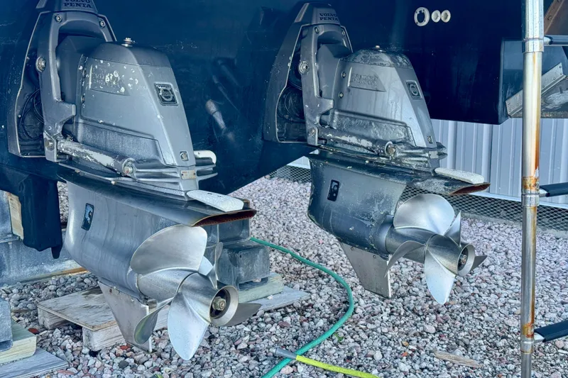 Slide: The Image of Twin Volvo Penta outdrives on a 2014 Regal 3200 Bowrider boat. - 31