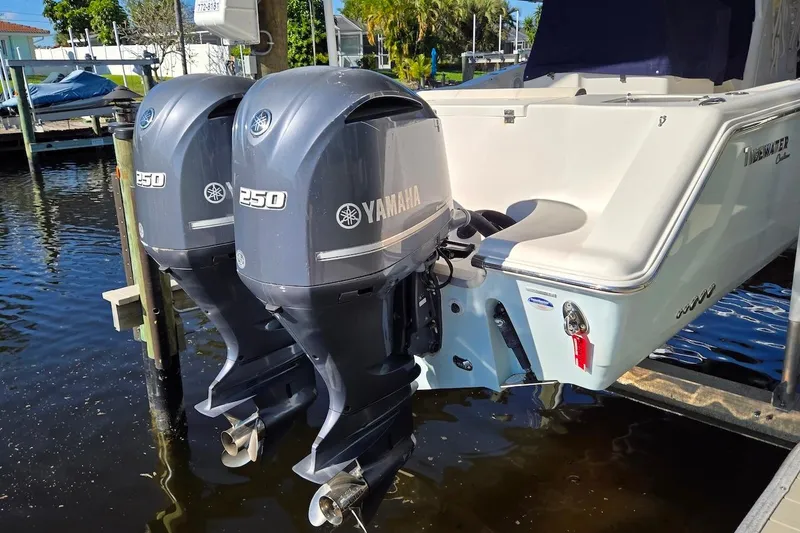 Slide: The Image of 2015 Tidewater 280 CC Adventure boat with dual Yamaha 250 outboard engines. - 22