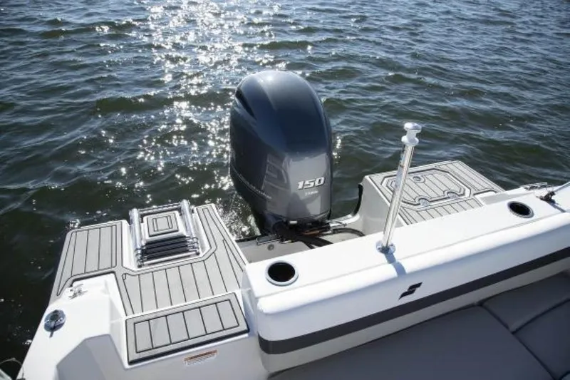 Slide: The Image of 2023 Starcraft SVX 171 boat with 150 HP outboard motor on water. - 15