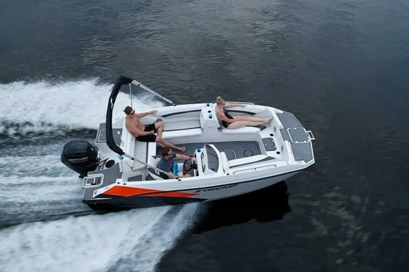 Slide: The Image of 2023 Starcraft SVX 171 boat cruising on water with passengers. - 5