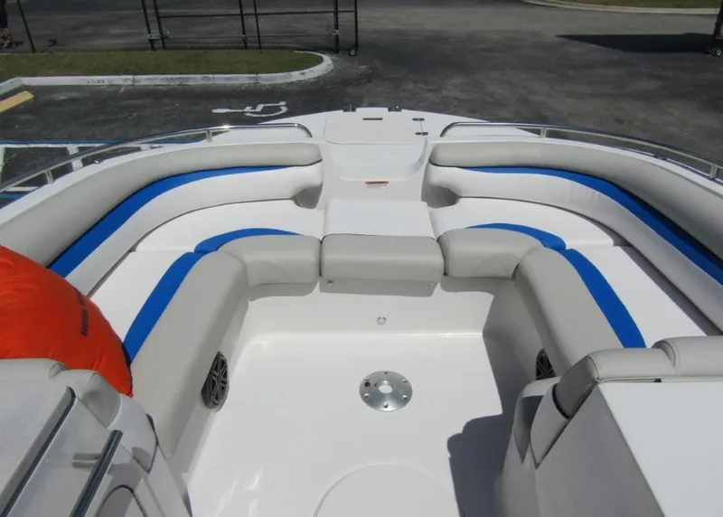 Slide: The Image of 2024 Starcraft 191 SVX boat interior with white and blue seating. - 18
