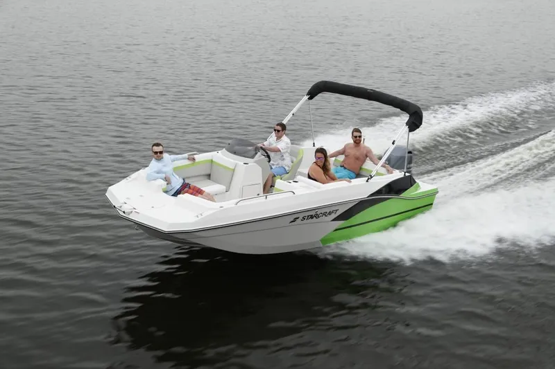 Slide: The Image of 2024 Starcraft 191 SVX boat cruising on water with passengers. - 2