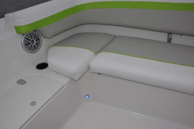 Slide: The Image of 2023 Starcraft 191 SVX boat interior with white and green seating. - 14