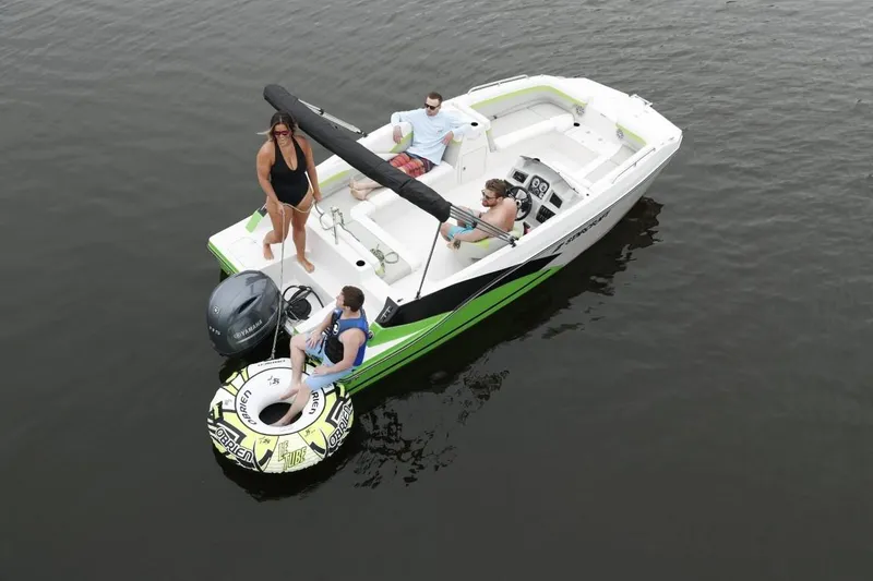 Slide: The Image of 2023 Starcraft 191 SVX boat with people enjoying water activities. - 3