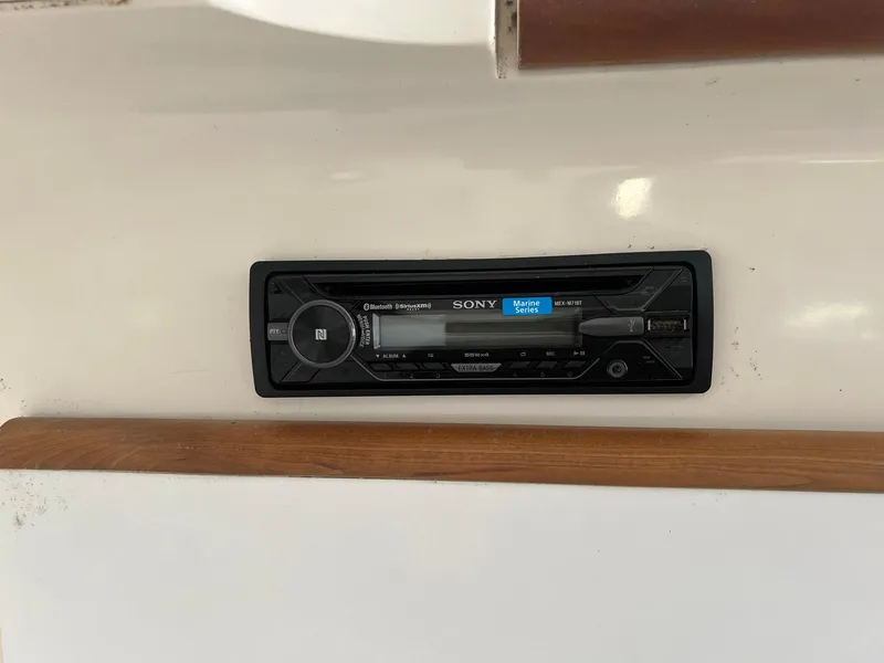 Slide: The Image of Sony stereo system in a 1996 Silverton 310 Express boat interior. - 16