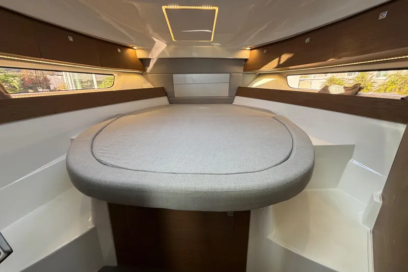 Slide: The Image of 2019 Jeanneau NC 895 cabin interior with modern design and comfortable seating. - 16
