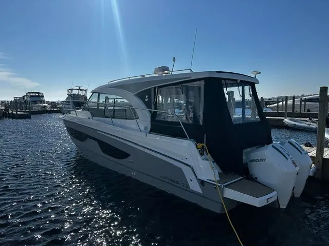 Slide: The Image of Beneteau Antares 11 Coupe 2026 docked in sunny marina. - 21