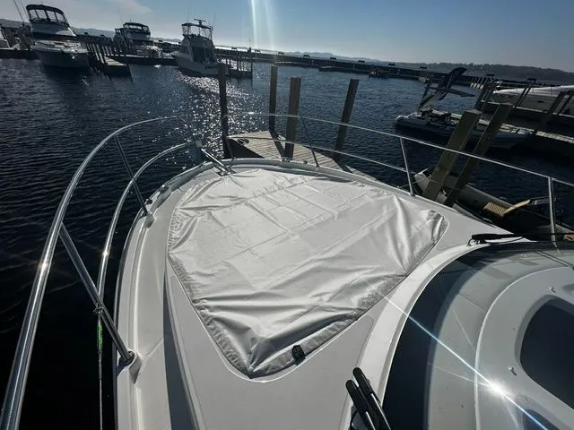 Slide: The Image of 2026 Beneteau Antares 11 Coupe docked, front deck view. - 24