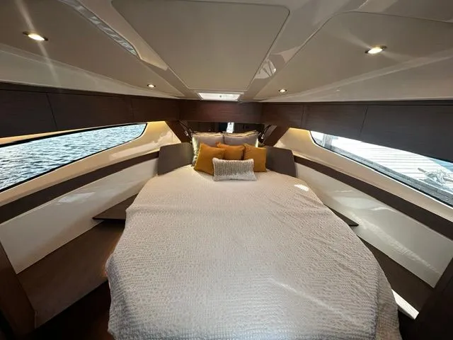 Slide: The Image of Interior of 2026 Beneteau Antares 11 Coupe with cozy bed. - 29