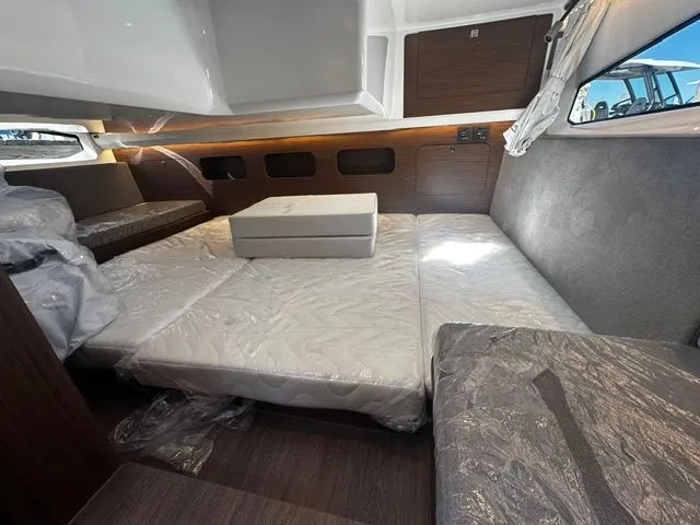 Slide: The Image of Interior of 2026 Beneteau Antares 11 Coupe with sleeping area. - 31