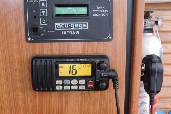 Slide: The Image of VHF marine radio and tank systems monitor on 2008 Catalina 350 MkII yacht. - 15