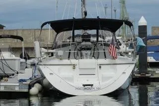 Slide: The Image of 2008 Catalina 350 MkII sailboat docked in a marina, rear view. - 3