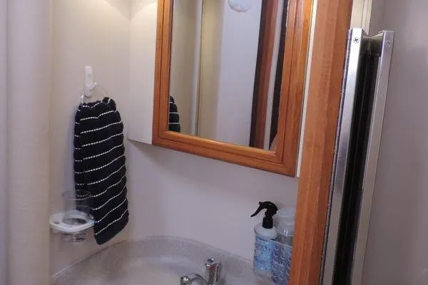 Slide: The Image of Bathroom interior of 2008 Catalina 350 MkII yacht with mirror and sink. - 31