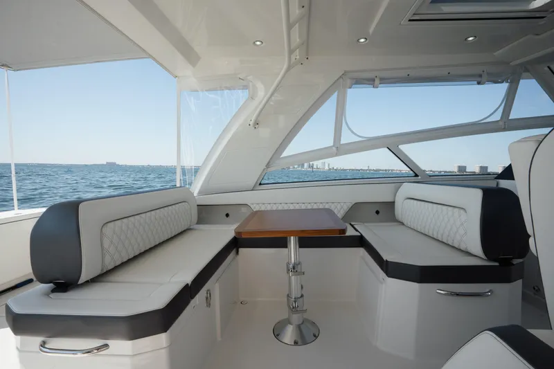 Slide: The Image of Luxurious interior of 2024 World Cat 400 DC-X boat with ocean view. - 17