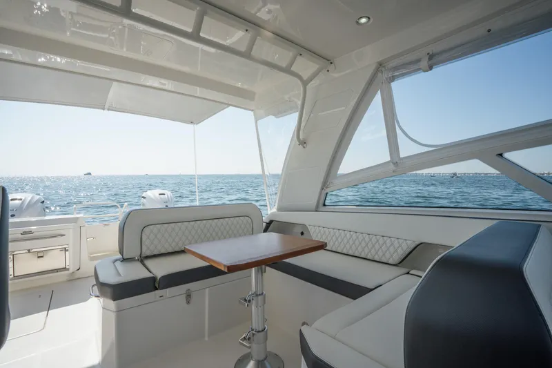 Slide: The Image of Luxurious interior of 2024 World Cat 400 DC-X boat with ocean view. - 18