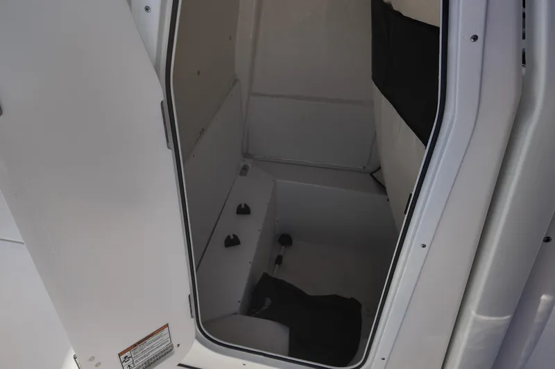 Slide: The Image of Interior view of 2026 Sea Fox 231 Bay Fox boat storage compartment. - 13