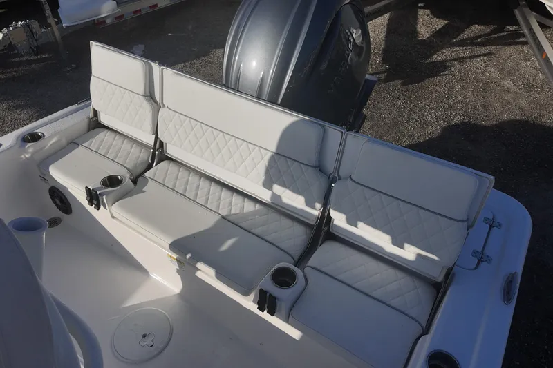 Slide: The Image of 2026 Sea Fox 231 Bay Fox boat seating with cup holders and quilted upholstery. - 19