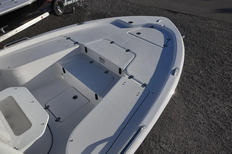 Slide: The Image of 2026 Sea Fox 231 Bay Fox boat deck with storage compartments. - 8