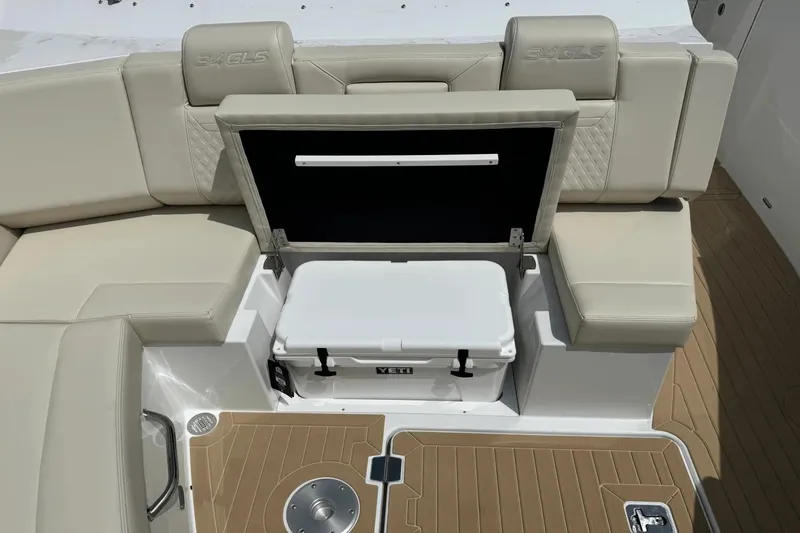 Slide: The Image of Luxury seating and cooler on 2026 Cruisers Yachts 34 GLS I/O boat. - 16