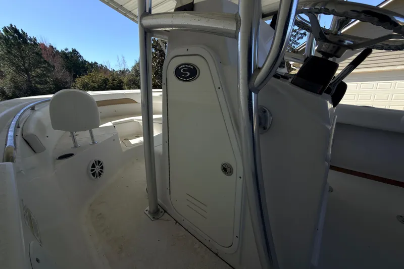 Slide: The Image of 2014 Sportsman Heritage 211 Center Console interior with equipment and storage. - 29