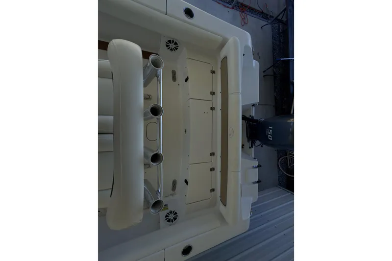 Slide: The Image of 2014 Sportsman Heritage 211 Center Console boat seat and console detail. - 36