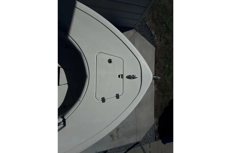 Slide: The Image of 2014 Sportsman Heritage 211 Center Console boat interior with steering wheel and controls. - 39