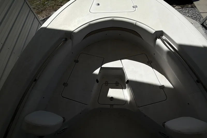 Slide: The Image of 2014 Sportsman Heritage 211 Center Console trailer label with tire and loading information. - 44