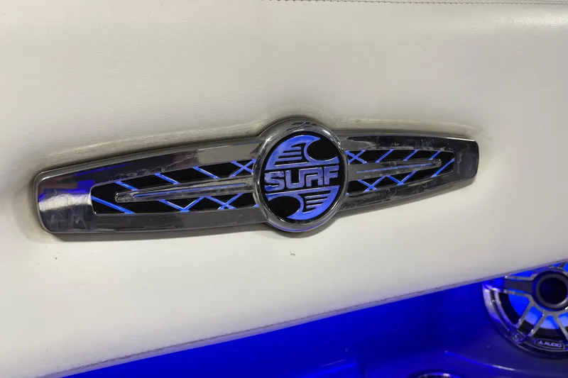 Slide: The Image of 2021 Chaparral 30 Surf logo with blue LED lighting on white background. - 19