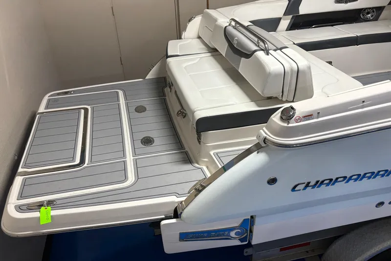Slide: The Image of 2021 Chaparral 30 Surf boat with spacious swim platform and comfortable seating. - 20