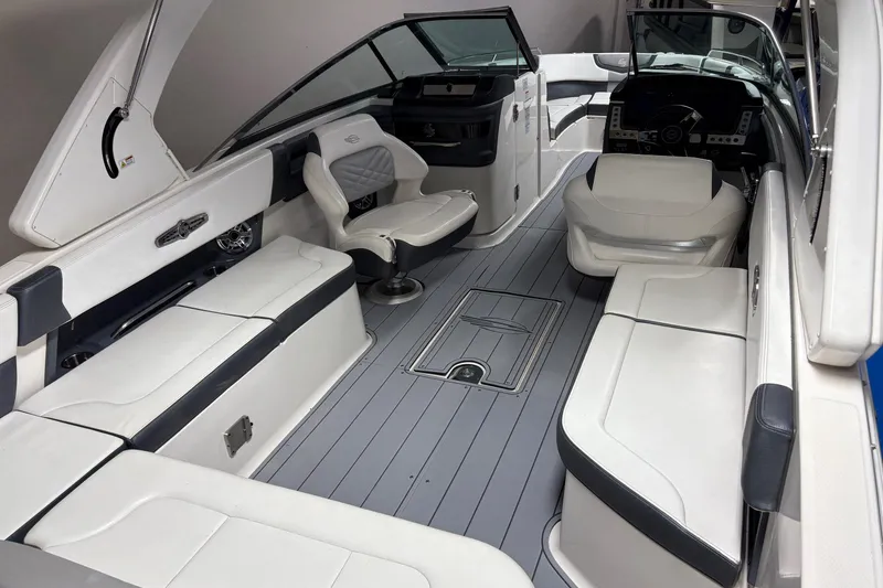 Slide: The Image of 2021 Chaparral 30 Surf boat interior with sleek seating and modern design. - 9
