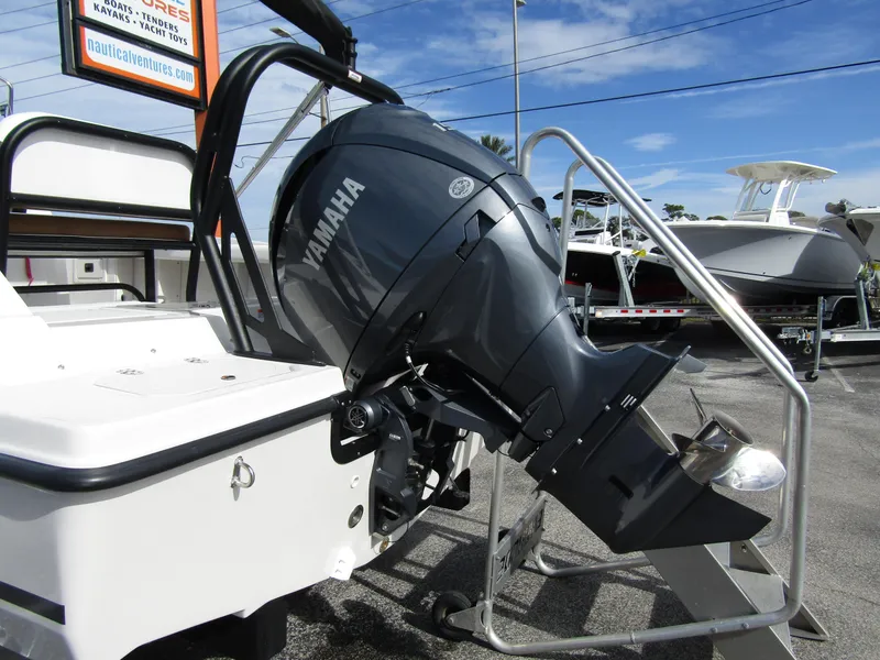 Slide: The Image of 2024 Starcraft SVX 191 OB CC with Yamaha outboard motor. - 2