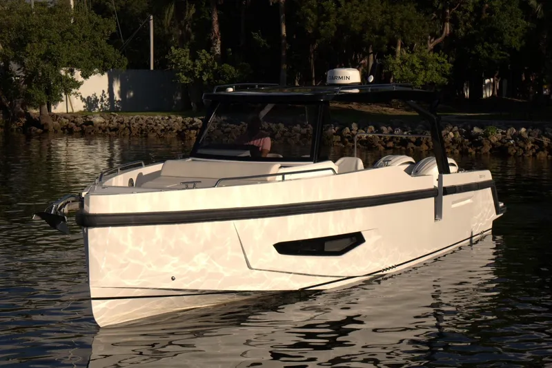 Slide: The Image of Modern Fabbro F33 yacht in urban waterfront setting, 2026 model. - 1